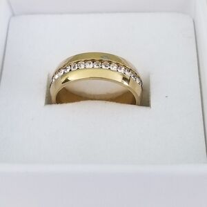 Elegant Plated Gold Band with CZ Stones. The Design Is A "Channel-Set". Size 7